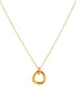 Delicate gold-plated necklace with three interlocking circle rings forming a minimalist knot pendant on cream background