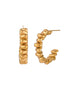 Sculptural gold-plated hoop earrings with continuous twisted spiral design on cream background